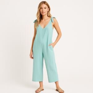 The Free Yoga Jumpsuit Medium Light Blue Pockets Tie Shoulder Side Zip Cropped
